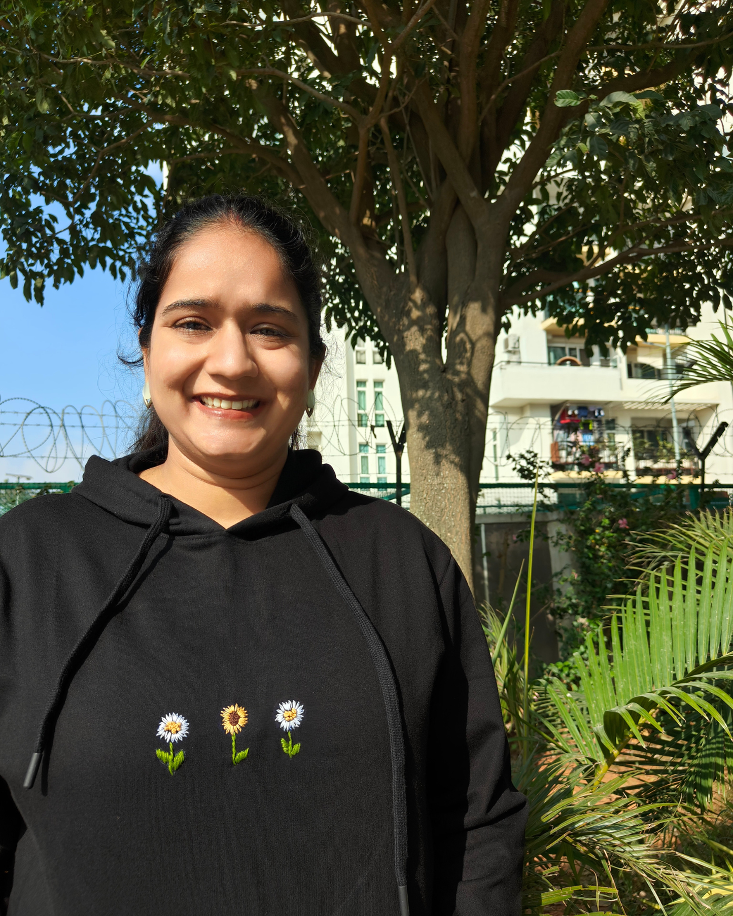 Cute black hoodie with minimalistic flowers