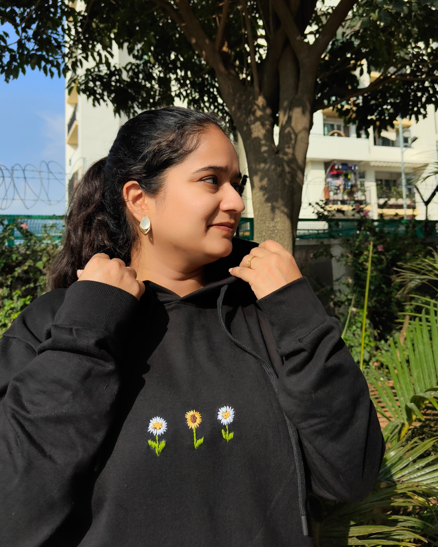 Cute black hoodie with minimalistic flowers